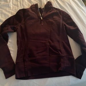 Maroon lululemon sweatshirt with shoulder detail. Size 4. Worn once.